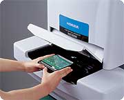 Load the sample holder into the XGT-5000/5100WR